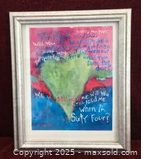 Front view of framed artwork showing entire piece