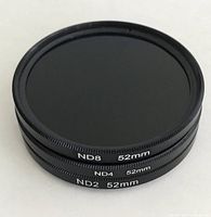 Stacked view of ND8, ND4, ND2 52 mm filters showing side markings