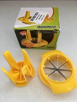 Box and disassembled slicer showing components