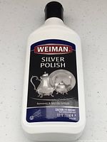 Front view of Weiman Silver Polish bottle showing label and size