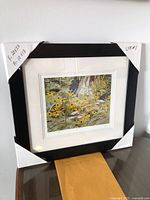 Full view of framed A.J. Casson limited edition print with corner protectors