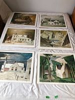 All six print designs laid out on bed