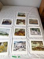 Overview of multiple Casson prints laid out on bed