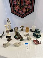 Full lot overview on tabletop showing all decorative items