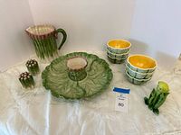 Group shot showing pitcher, platter with dip bowl, shakers, four small bowls, peas-in-a-pod figurine