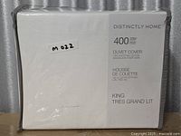 Front view of sealed duvet cover package showing brand and specifications