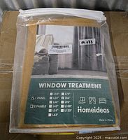 Front of packaged curtain showing brand and product details