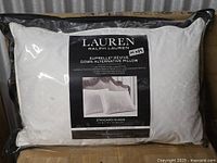Front view of sealed Ralph Lauren pillow package