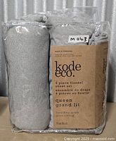 Front view of sealed Kode Eco queen flannel sheet set package