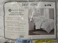 Front of packaging showing Swift Home Floral Pintuck 3-piece Comforter Set details and sizing