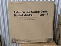 Sealed box labeled Extra Wide Swing Gate model 4649, Qty 1