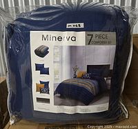 Front of sealed Minerva 7-piece comforter set package