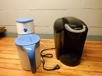 Front view of both appliances and pitcher