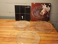 All three crystal platters with packaging visible