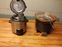 Both electric fryers side by side showing overall condition