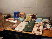 Overview of stacked and laid-out kitchen linens