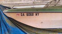 Port bow showing GA 6068 NY registration on hull