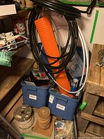 overall lot showing totes, membrane, conduit, spools