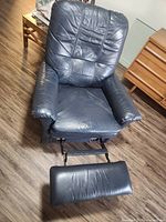 Recliner extended showing leather upholstery and footrest