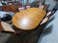 Top view of teak dining table with six chairs