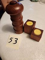 Group shot showing pepper mill and two tealight holders