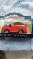 Front view of boxed 1955 Dennis fire engine model