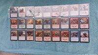 All 27 sleeved cards laid out face up