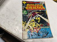 Front cover of Marvel Battlestar Galactica Issue 1 comic showing artwork and wear