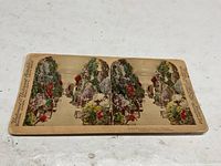 Front of stereoview card showing twin images and publisher credit