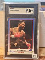 Front view of graded 1991 Kayo Lennox Lewis #68 boxing card showing SGC 9.5 grade and serial