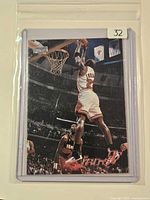 Front view of card in protective sleeve showing image, logo, and Jams ’97 text