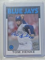 Front of 2020 Topps Archives Tom Henke autographed baseball card in protective sleeve