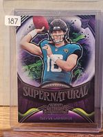 Front of 2021 Panini Supernatural Trevor Lawrence rookie card in sleeve