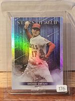 Front of 2022 Topps Stars of the MLB Shohei Ohtani rainbow-foil card in protective sleeve