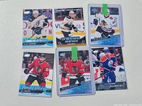 All six Upper Deck Young Guns hockey cards in protective sleeves