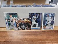 Front view of four Topps MLB cards: Gerrit Cole Yankees, Yankees celebration, Cody Bellinger Dodgers, and Yankees batter