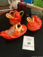 three Royal Bayreuth lobster form porcelain pieces on table