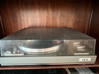 Front view of Akai AP-306 with dust cover in place