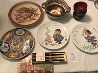 Group shot showing all porcelain plates, lacquer bowls, chopsticks