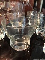 Close view of individual glass showing shape and foot