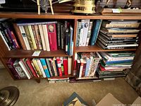 Entire two-shelf section filled with books