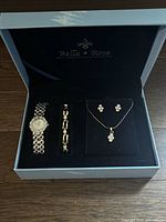 Full view of open Bella & Rose box showing all four jewelry items