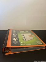 Closed orange Staples Better binder