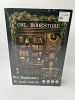 Front of sealed Owl Bookstore DIY Book Nook Kit box