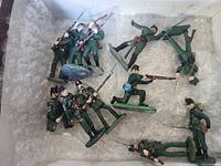 Soldiers in box with bubble wrap showing mixed poses and condition