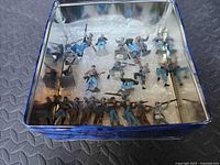 Top view of tin showing group of Civil War miniatures