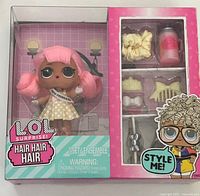 Front of sealed LOL Surprise Hair Hair Hair doll box showing doll and accessories
