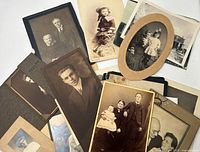 Group shot showing bulk of cabinet cards and prints