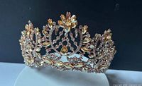 Front view of tiara showing overall design and stones