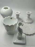Full group shot of six milk glass pieces